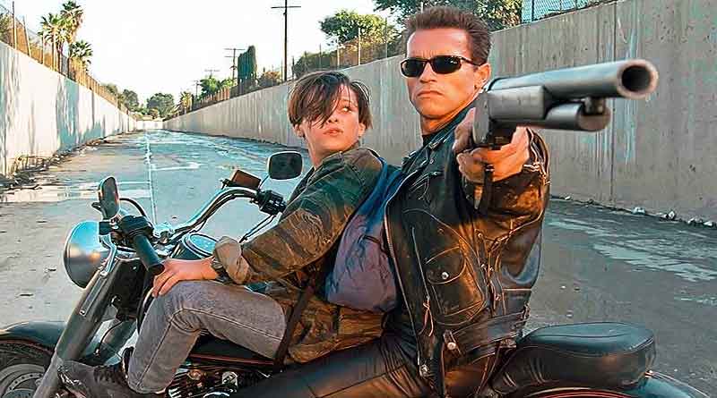 Edward Furlong as John Connor and Arnold Schwarzenegger in Terminator 2 Judgment Day