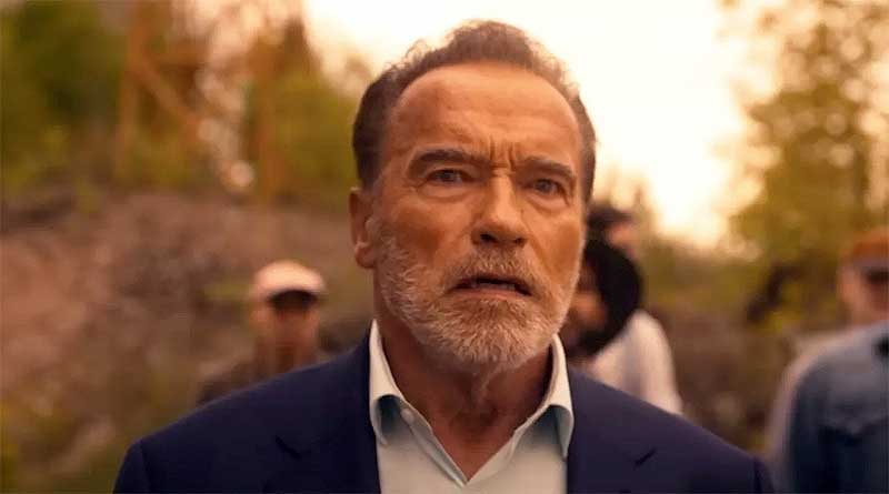 Arnold Schwarzenegger wearing a shocked expression in broad daylight in FUBAR