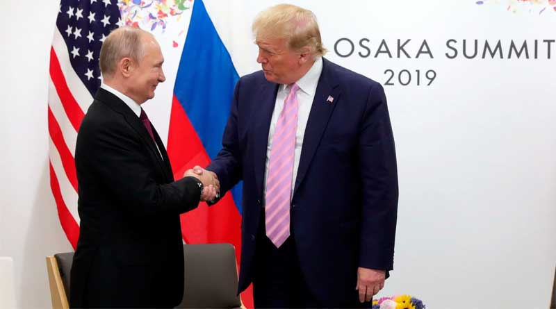 Presidents Donald Trump and Vladimir Putin attend a summit in Osaka, Japan, in 2019